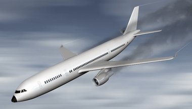 Sonhar com avião caindo e pegando fogo