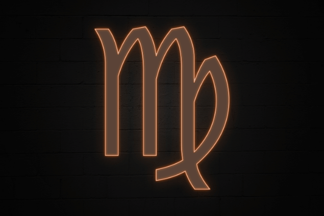 Símbolo do signo de Virgem em marrom neon brilhante sobre fundo escuro.