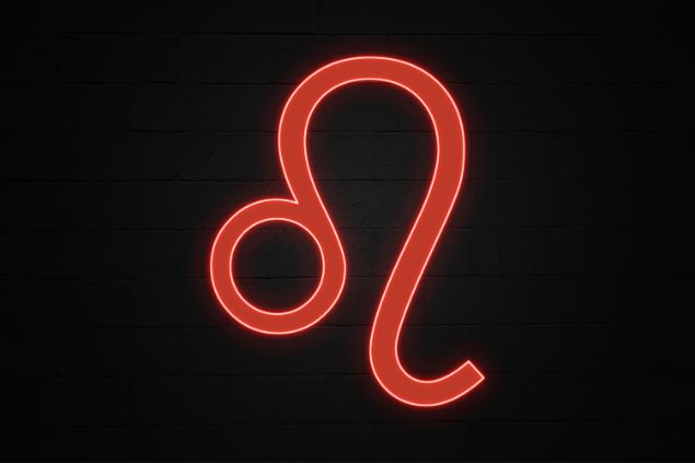 Imagem de fundo preto e em destaque o glifo do signo de leão na cor vermelha.