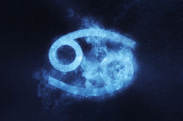 Imagem em azul do símbolo do signo de câncer.