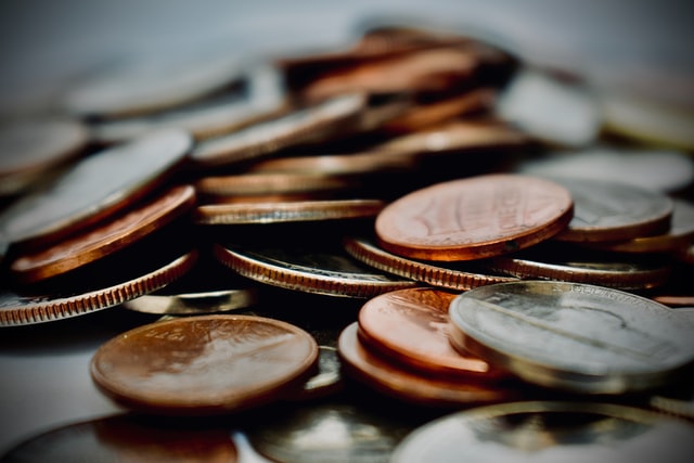 Moedas.